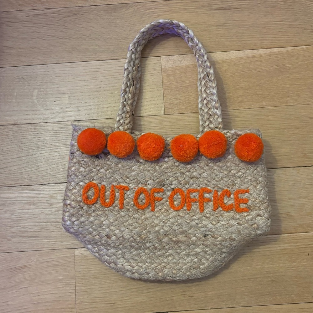 One of a kind “Out Of Office” natural tote with orange pom poms